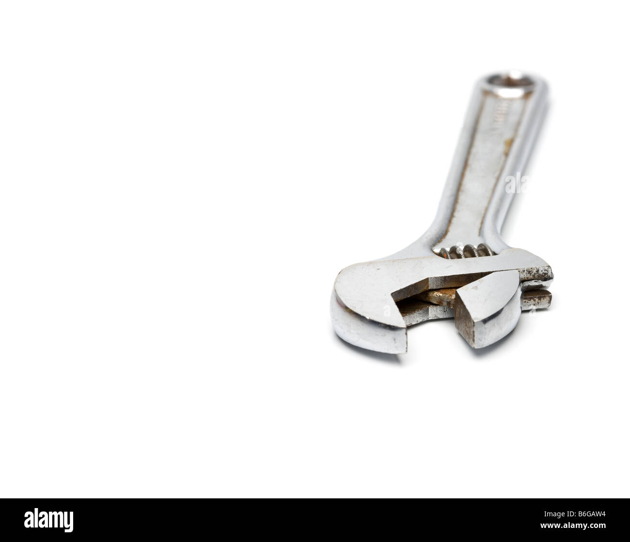 Utile bricolage Monkey Wrench utensile isolato su bianco bakcground Foto Stock