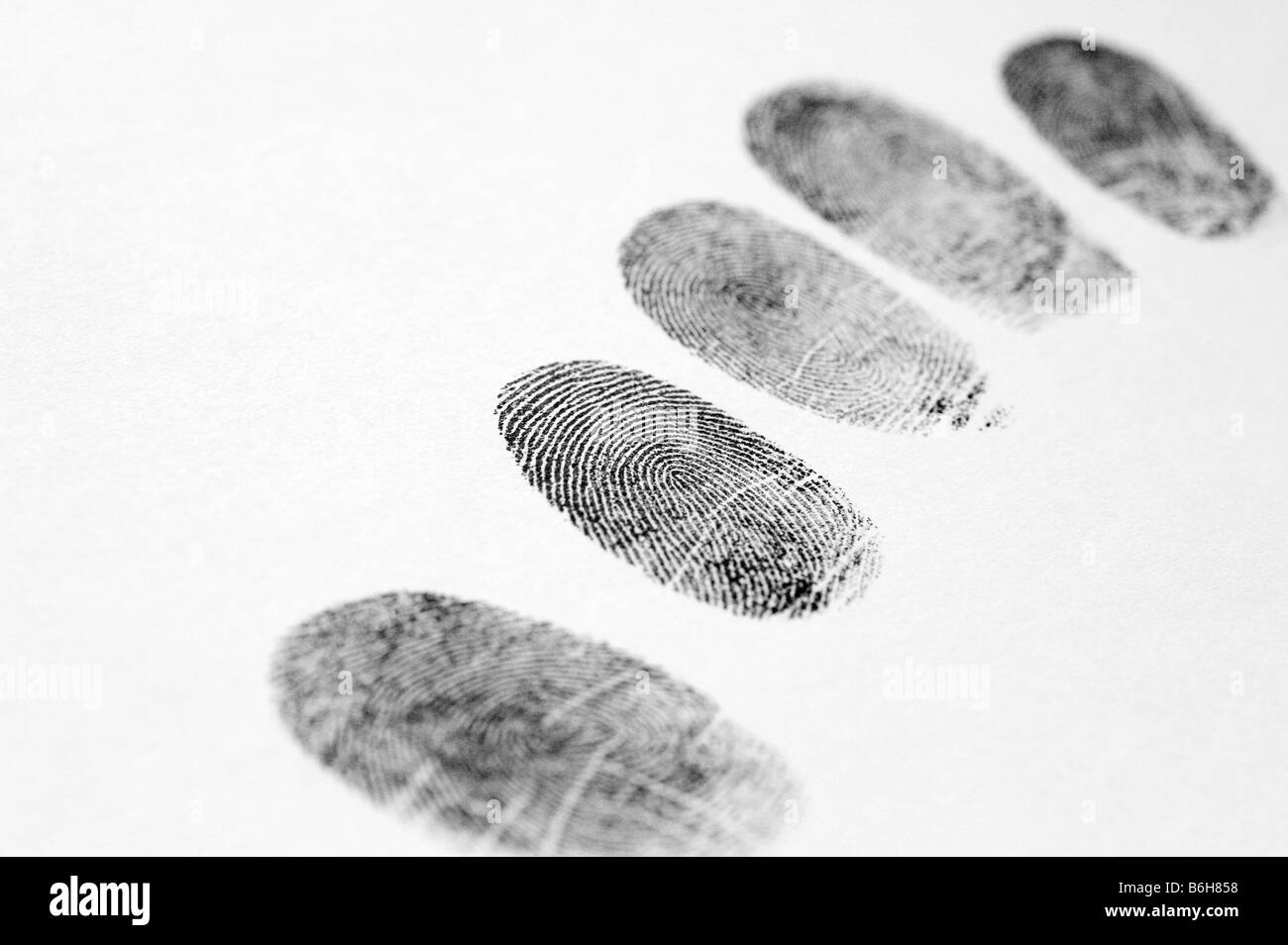 Impronte digitali con uno sfondo bianco e la profondità di campo Foto Stock