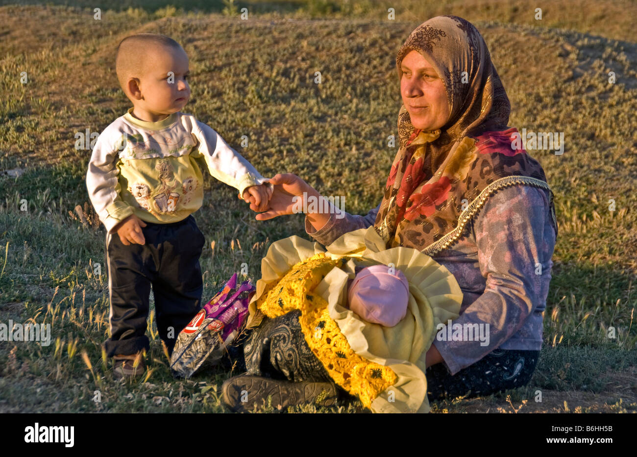 Bagno turco madre con figli per motivi di vecchi Van sito storico Foto Stock