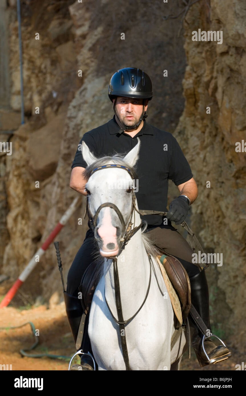 Uomo a cavallo Foto Stock