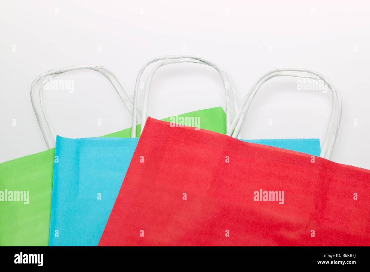 Tre colorate borse per lo shopping Foto Stock