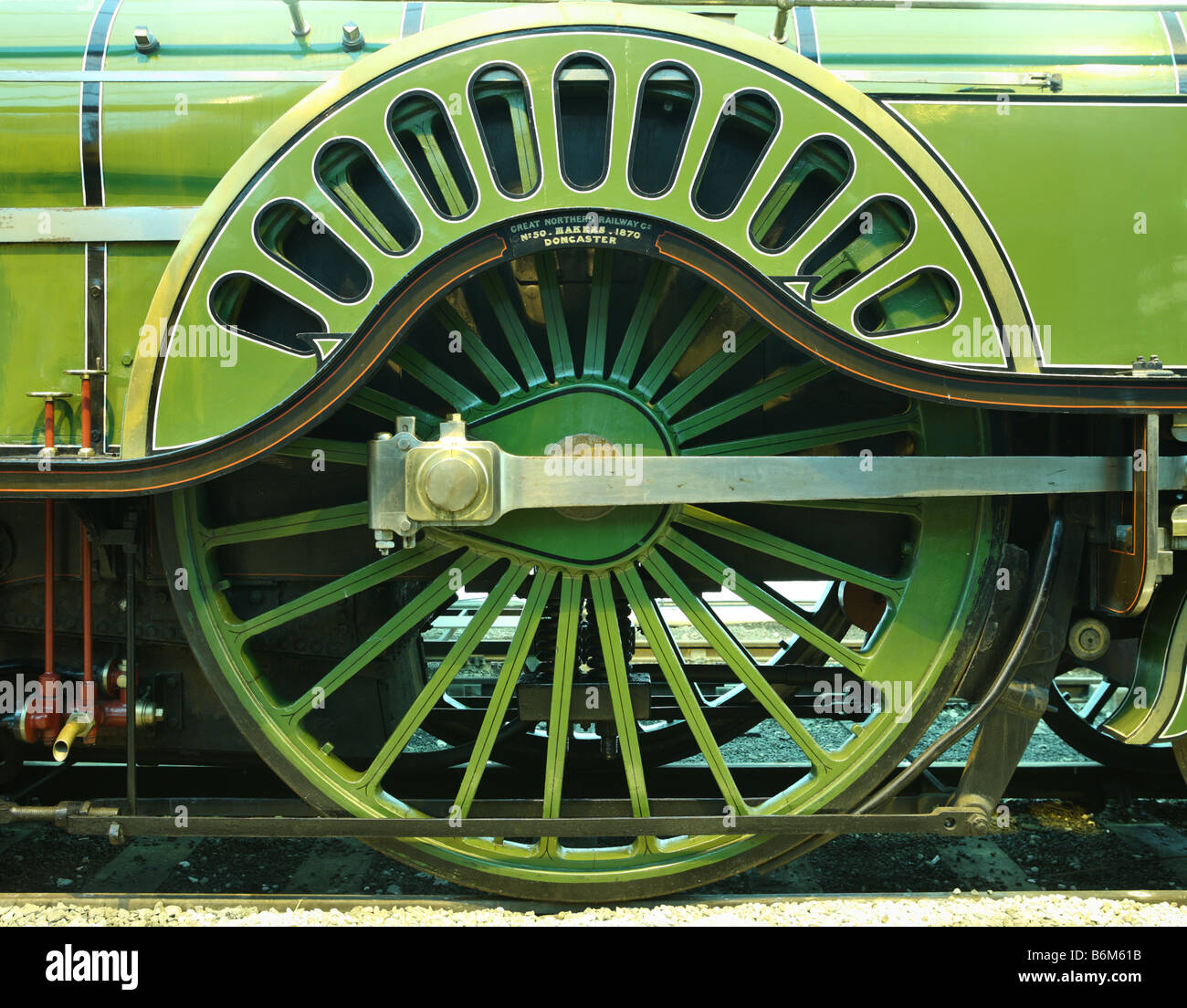 Ruota motrice di Stirling unica locomotiva a vapore all'interno della National Railway Museum, York, Inghilterra. Foto Stock