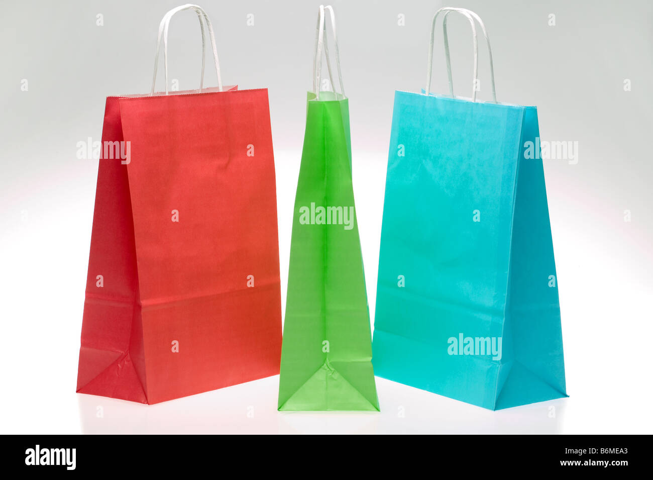 Rosso Verde e Blu della carta borse per lo shopping Foto Stock