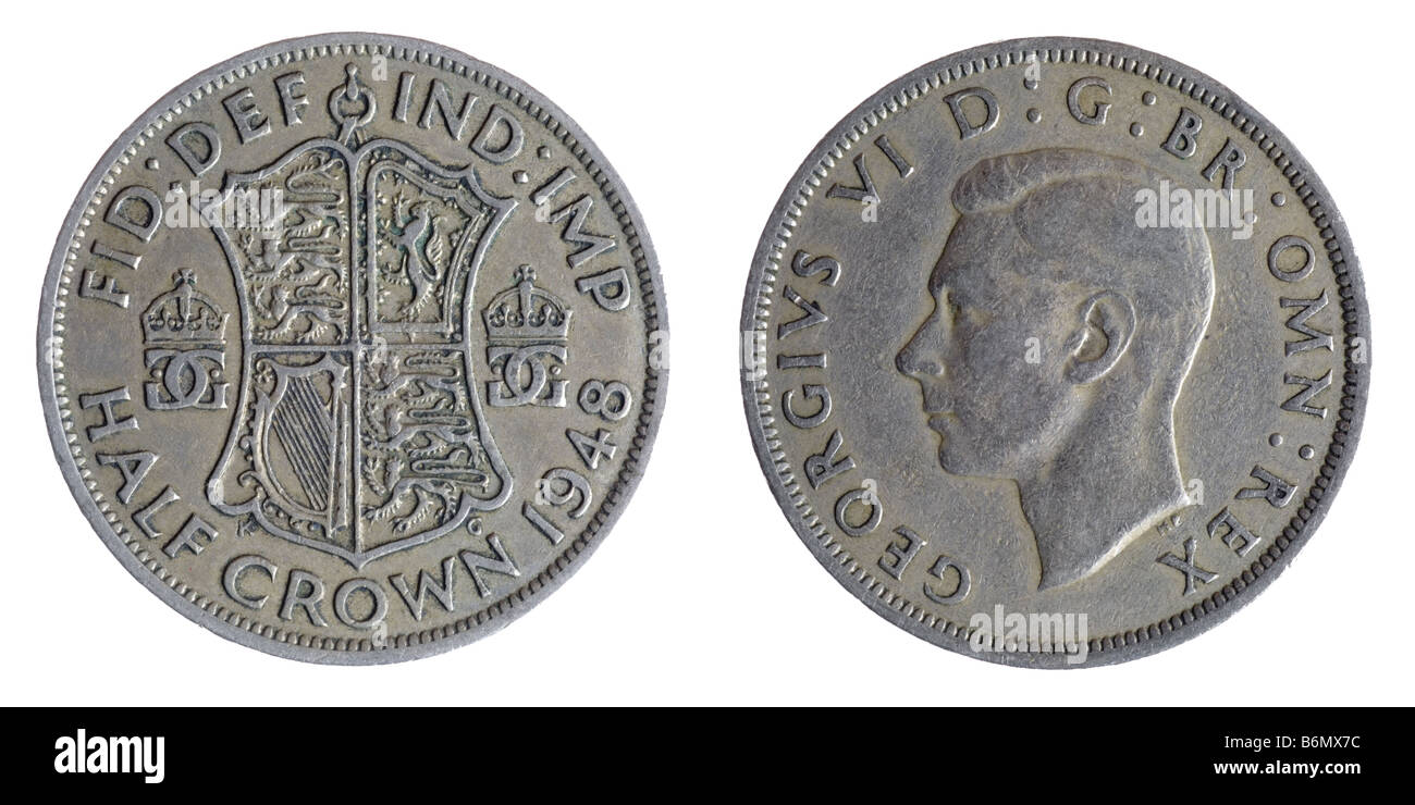 Vecchie monete Britanniche mezza corona Foto Stock