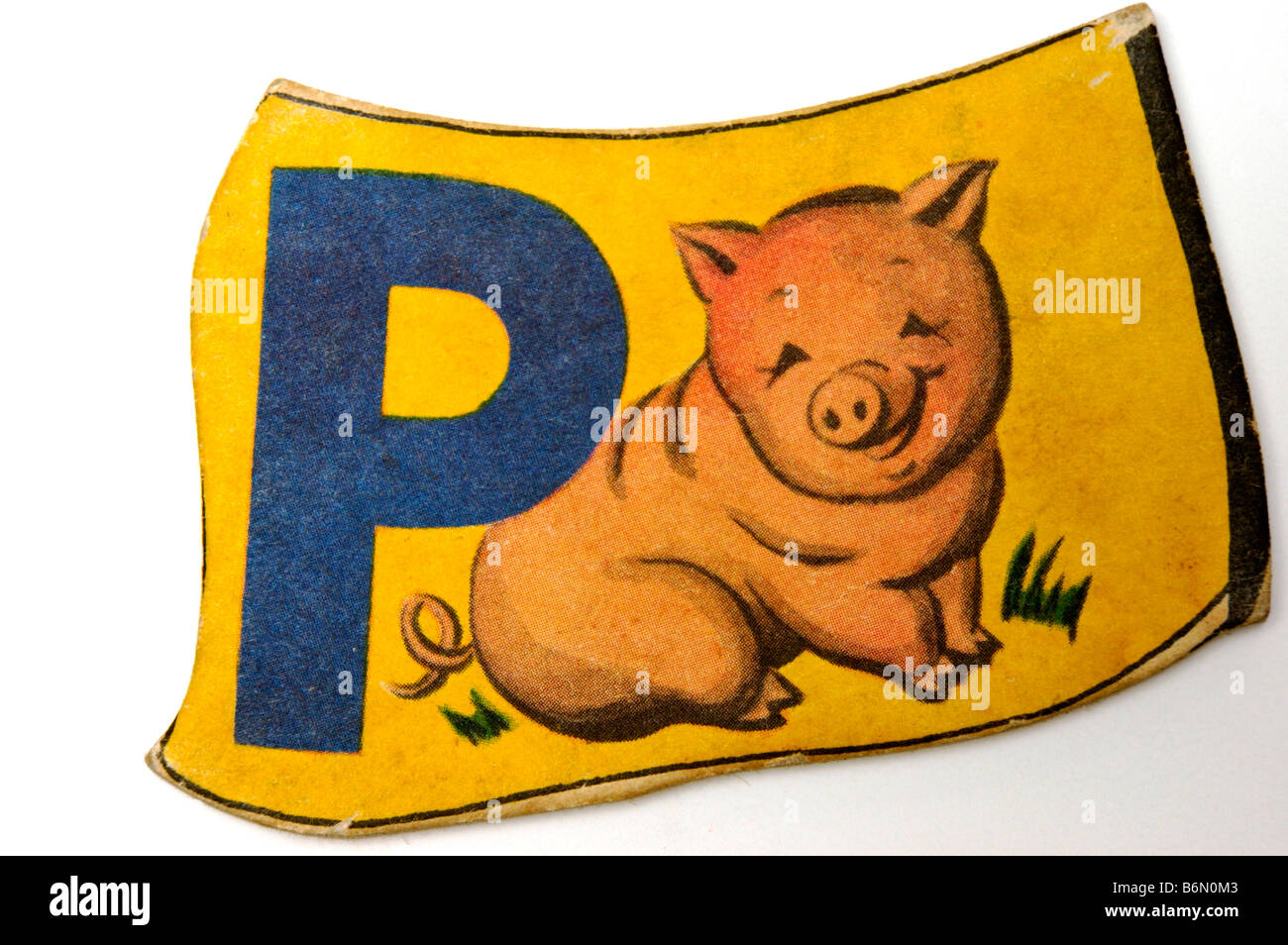 Vintage lettera alfabeto pezzo di puzzle per i bambini con la lettera L e la foto dei lecca lecca stampati su di essa Foto Stock