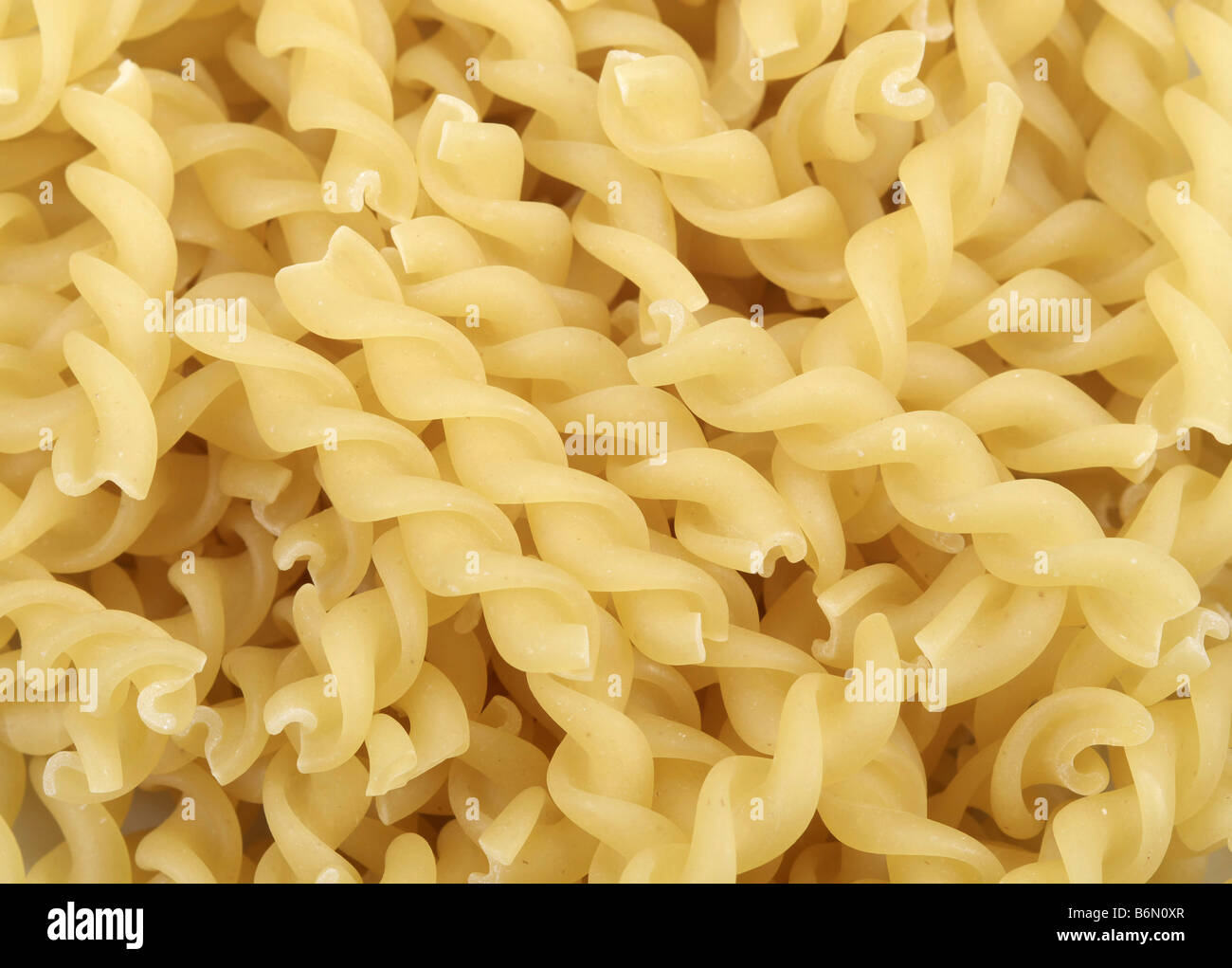 Close up di fusilli per gli sfondi Foto Stock