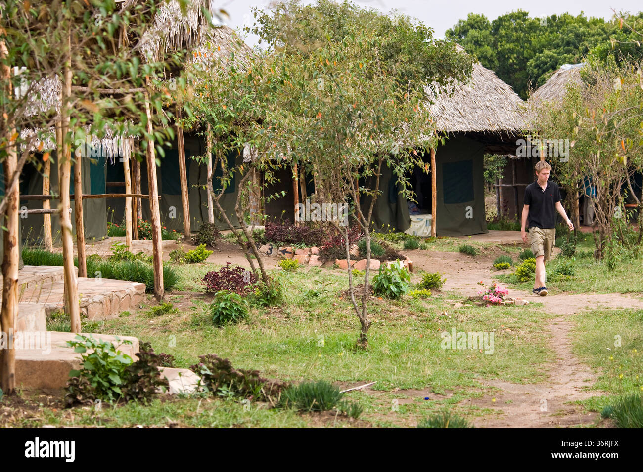 Lodge e turista, parco giochi Masai Mara Kenya Africa Foto Stock
