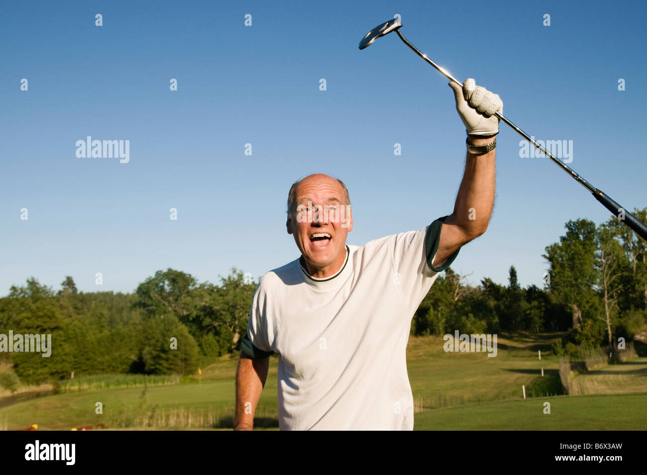 L'uomo riesce a golf Foto Stock