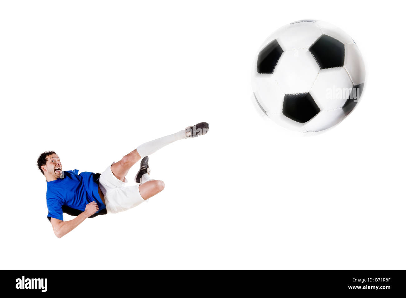 Giocatore di calcio in piena azione isolata studio immagine Foto Stock