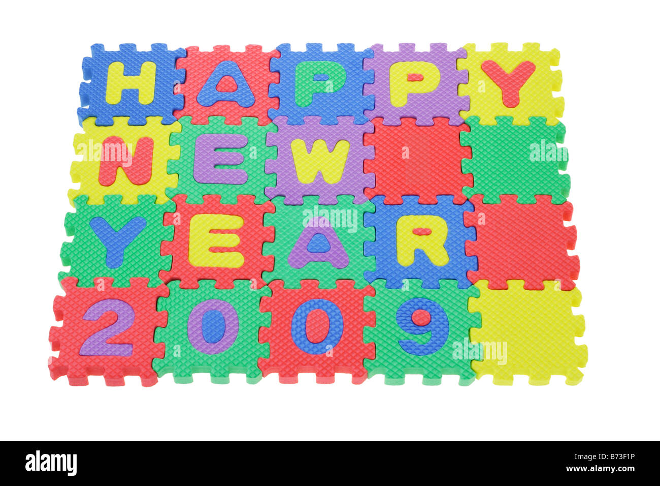 Alfabeto colorato blocchi puzzle assemblati per visualizzare Felice Anno Nuovo 2009 Foto Stock