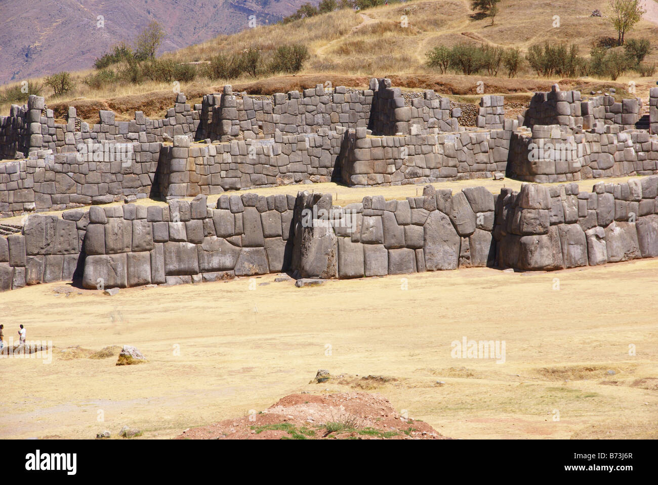 Massicce mura di pietra in fortezza Inca pareti Sacsayhuaman Cusco Peru Sud America Foto Stock
