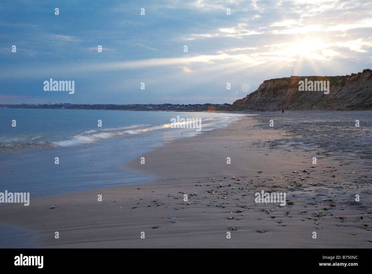 La spiaggia di testa Hengistbury al crepuscolo. Foto Stock