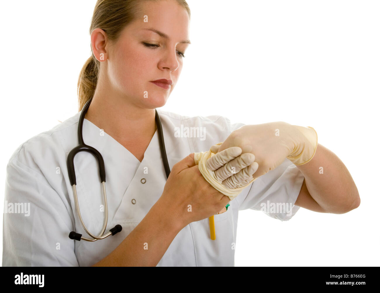 L'infermiera attrarre guanto Foto Stock