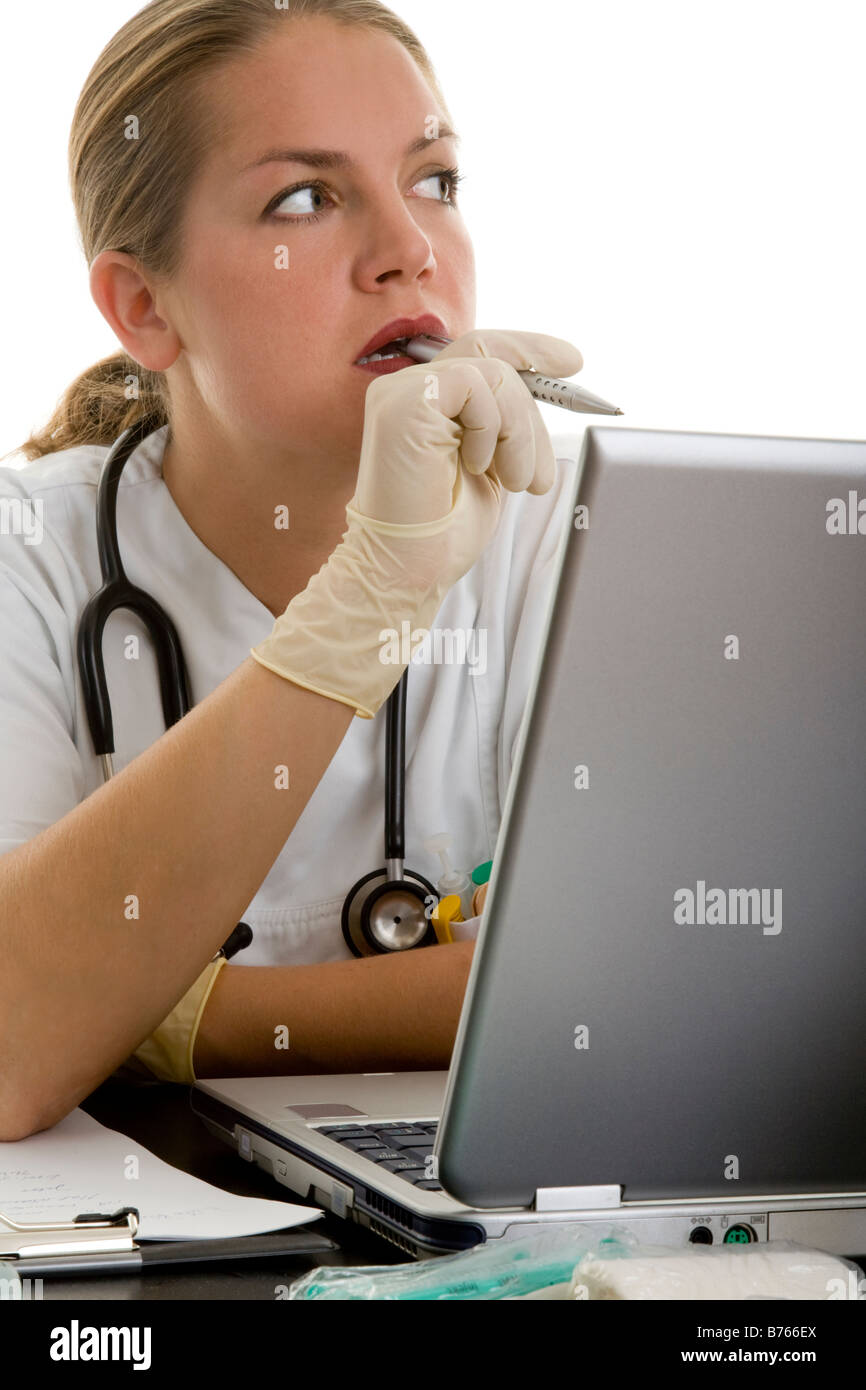 Medico donna sulla scrivania Foto Stock