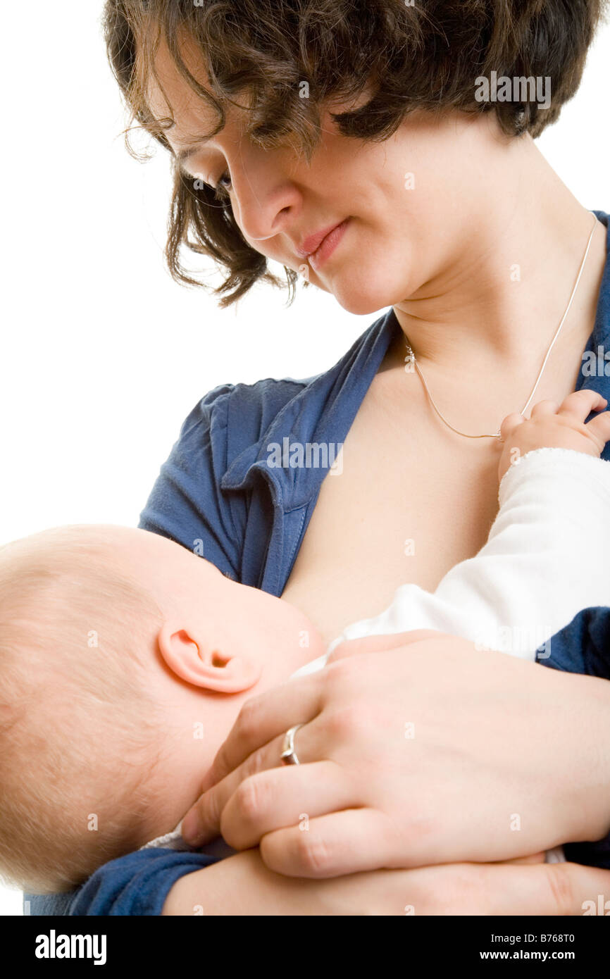 La madre di allattamento al seno Foto Stock