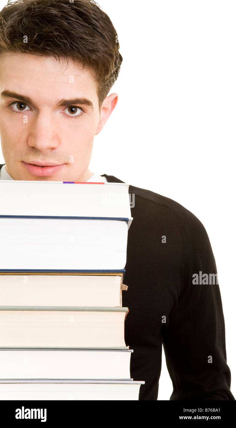 Giovane uomo con molti libri Foto Stock