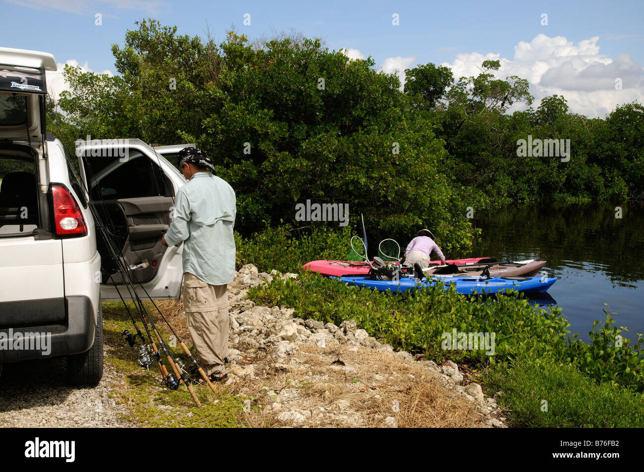 Andando fishin preparando per un viaggio di pesca a Sanibel isalnd Florida USA Foto Stock