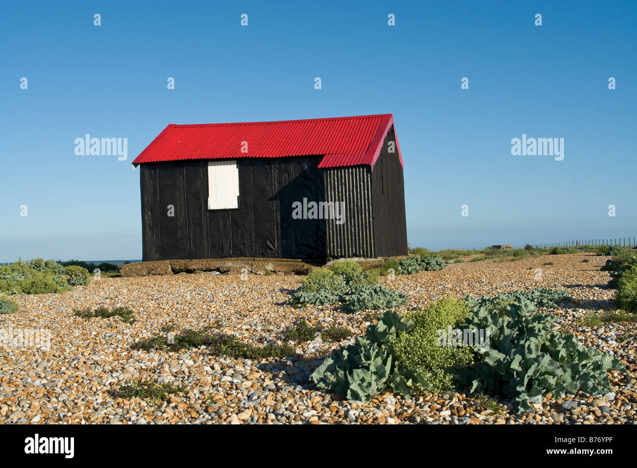 Nero, Red & White Beach Hut. Foto Stock