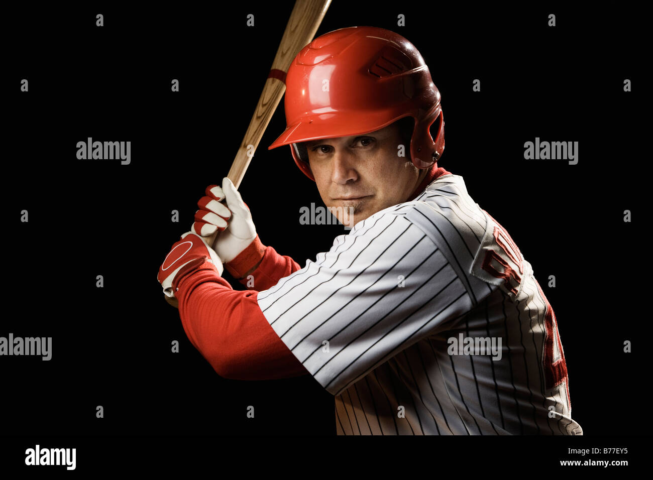 Ritratto di pastella tenendo mazza da baseball Foto Stock