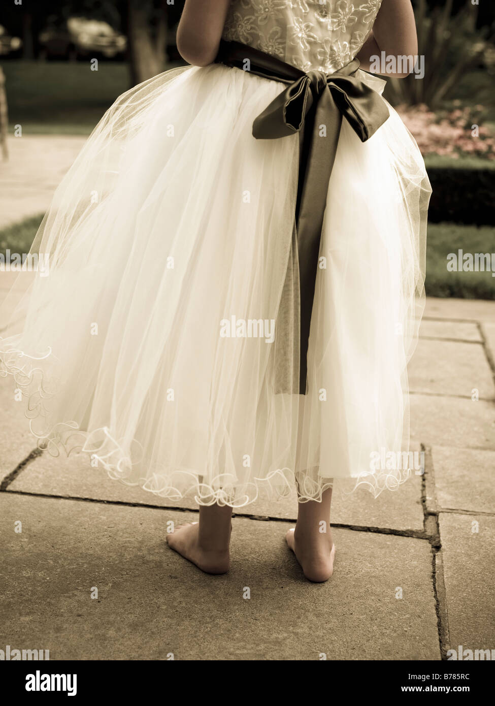Fiore ragazza al matrimonio, dettaglio degli abiti Foto Stock