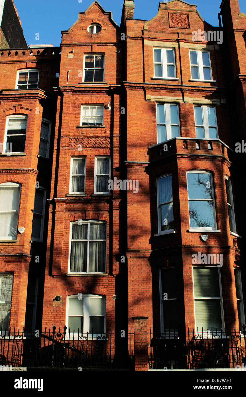 Mattone rosso condominio In Brompton Road Chelsea London SW3 REGNO UNITO Foto Stock