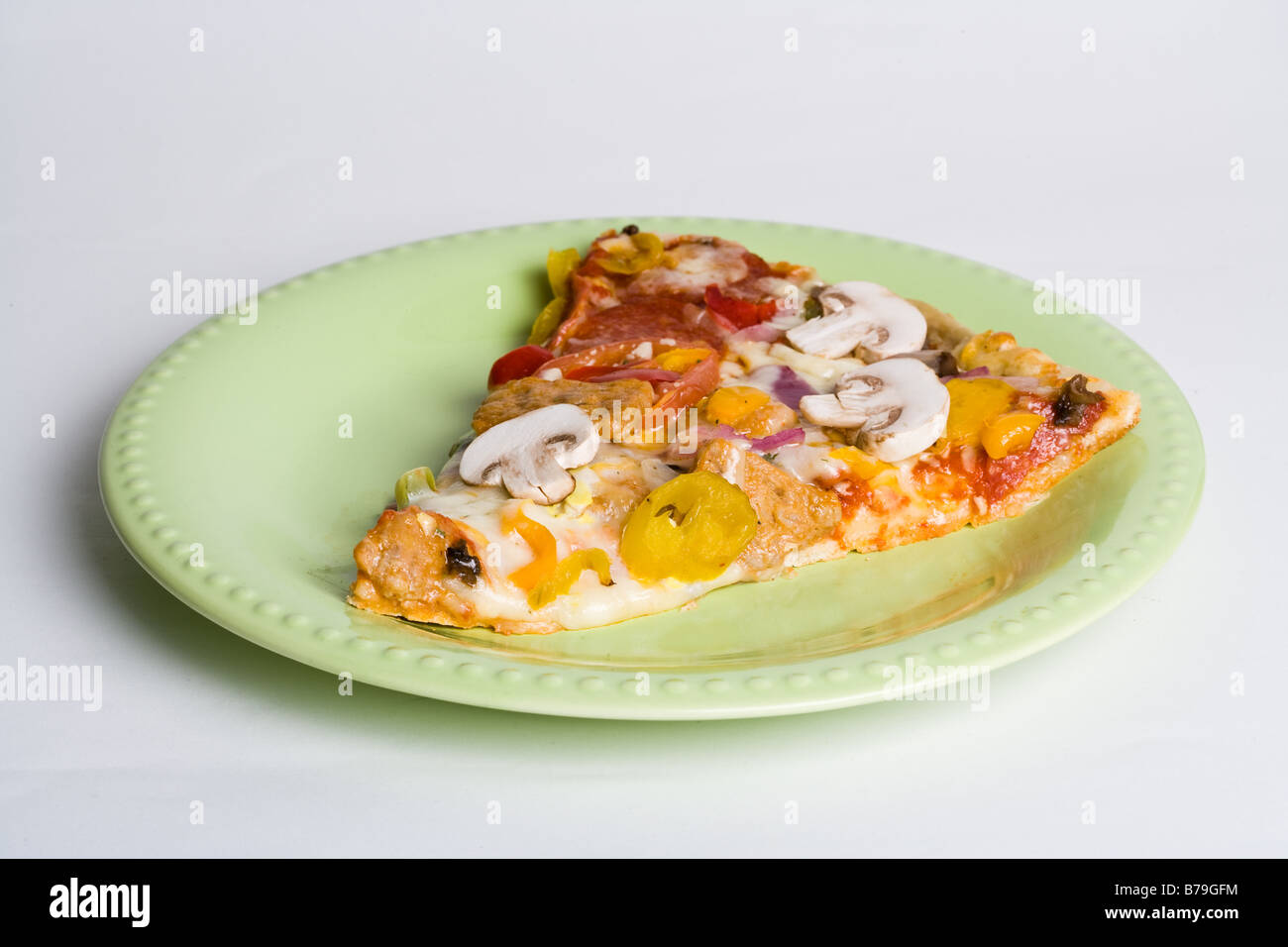Un pezzo di pizza Foto Stock