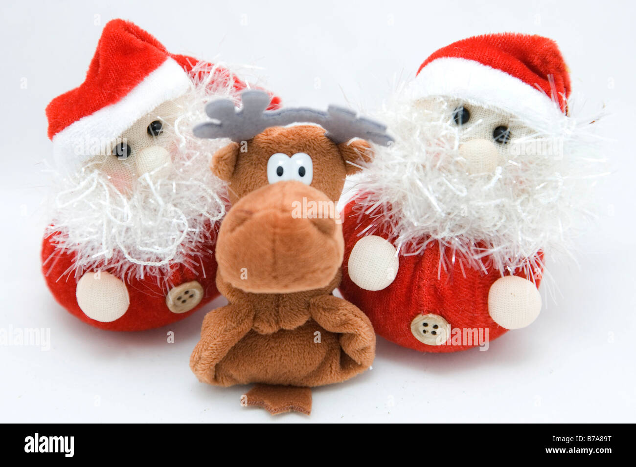 Due Santa Claus figure con un ripieno a base di renna Foto Stock