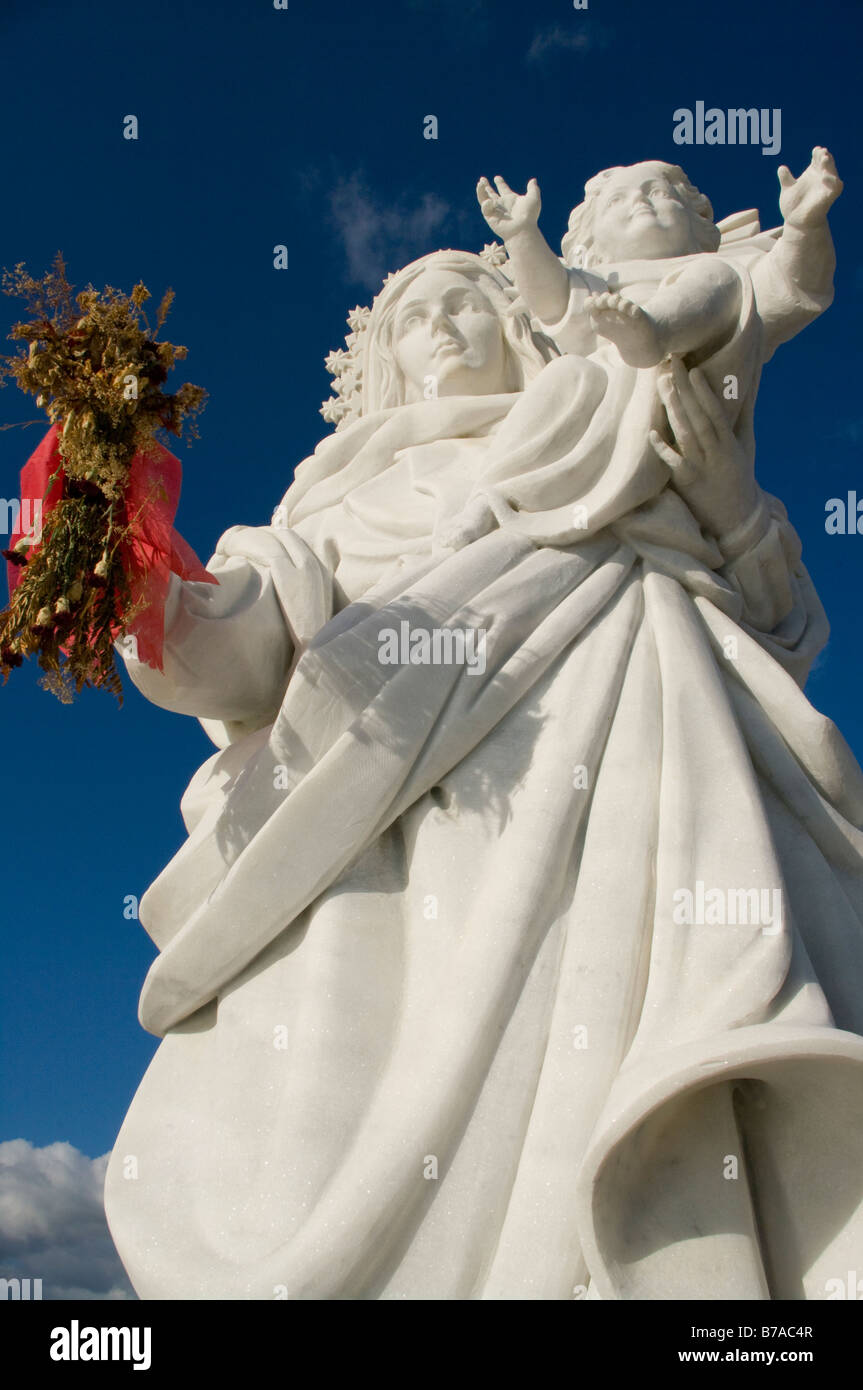 Monumento al Pescador statua della Madonna tenendo un Baby al Porto di Garrucha Almeria Spagna spagnolo statue Foto Stock