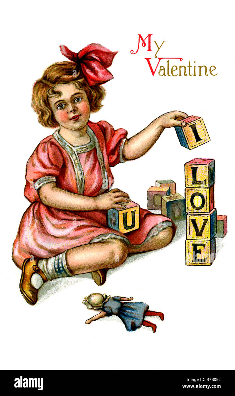 Ragazza in abito rosso con la lettera dei giocattoli Il mio Valentine ti amo Foto Stock