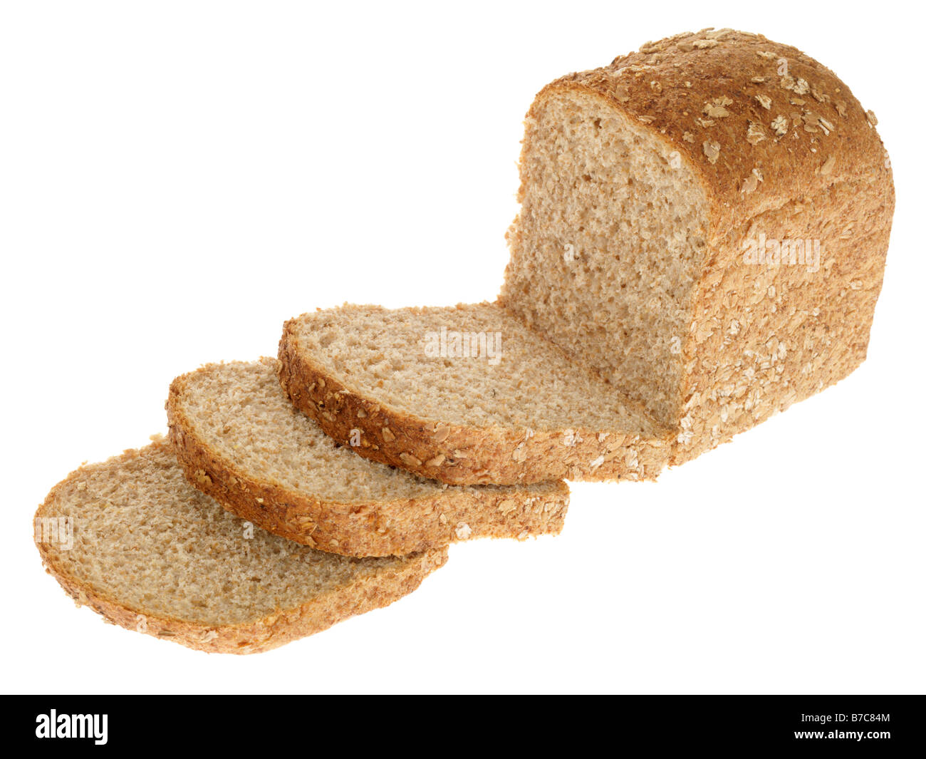 Filone di Brown integrali pane organico contro uno sfondo bianco con nessun popolo con copia di spazio e di un tracciato di ritaglio Foto Stock