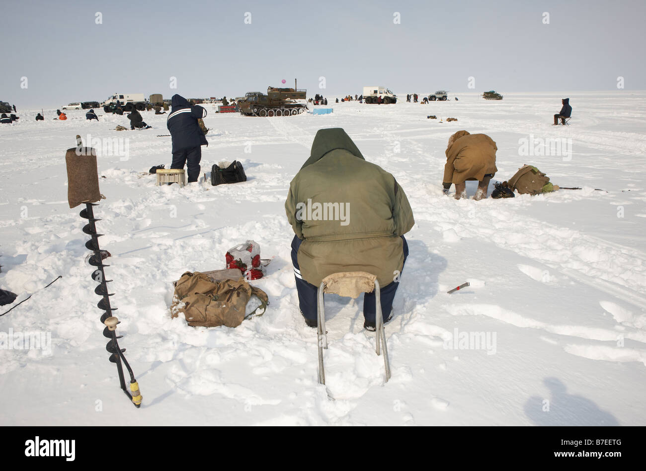 Pesca sul ghiaccio per smelleds, Anadyr Chukotka, Siberia, Russia Foto Stock