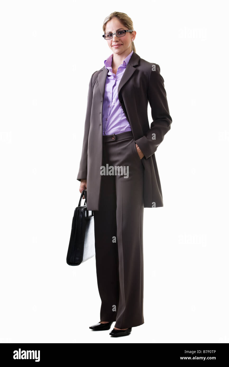 La donna in grigio pant suit Foto Stock
