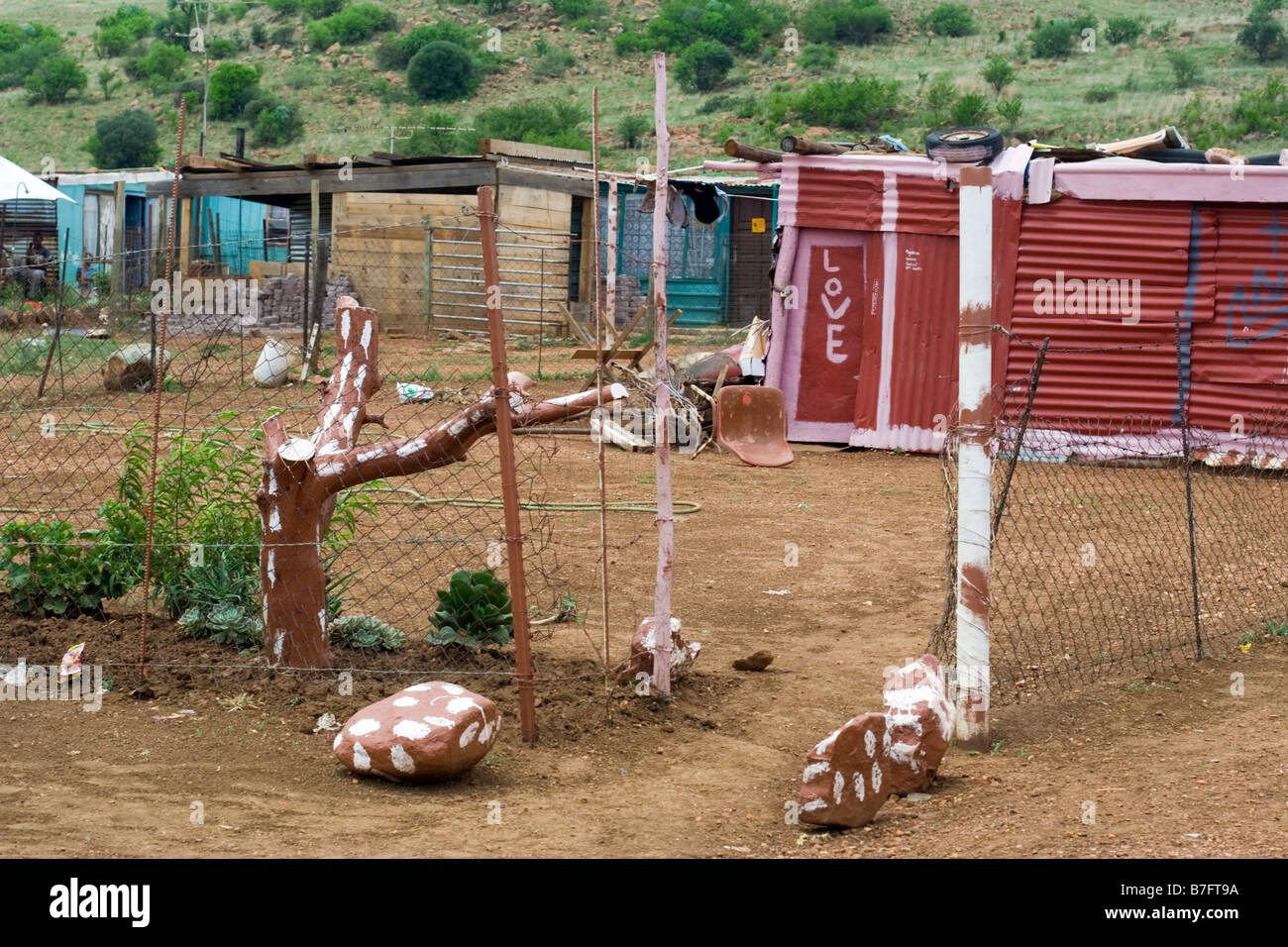 Decorative e innovativo homestead in un squatter camp, Gauteng, Sud Africa Foto Stock