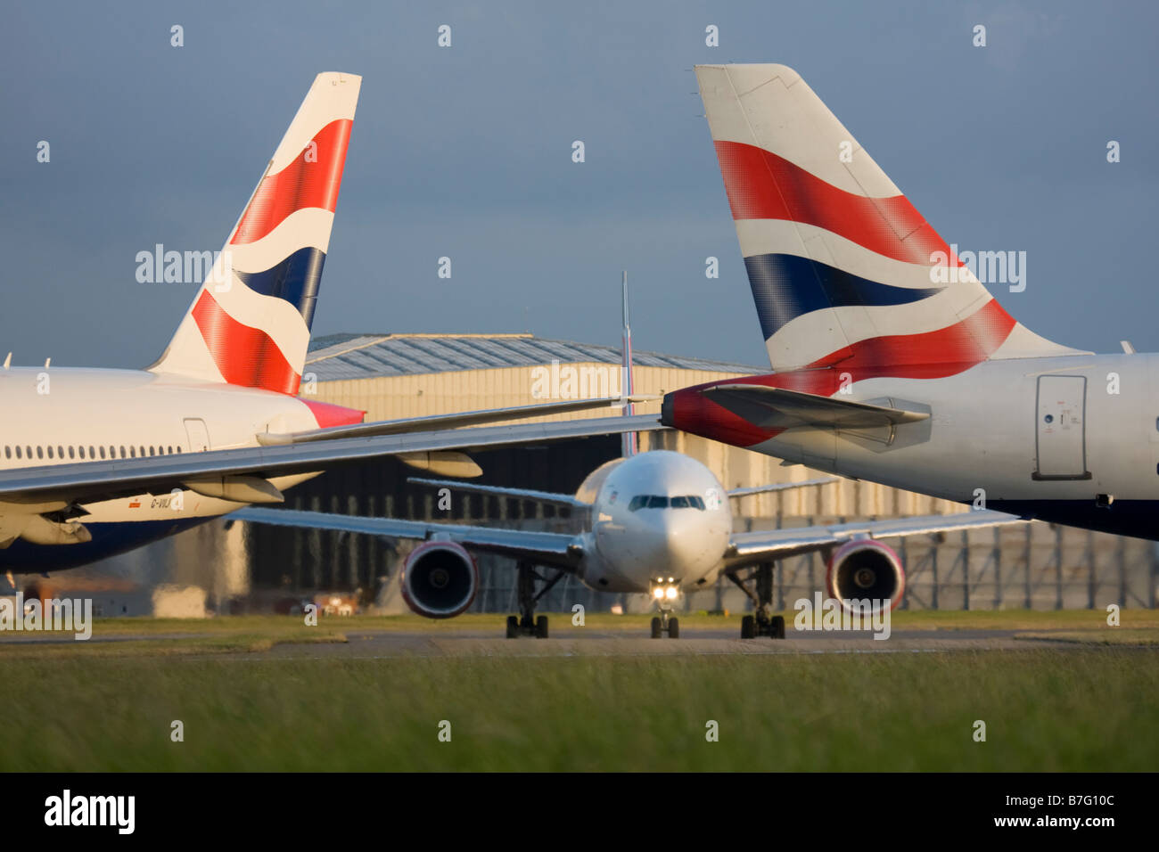 Code di British Airways aerei all'aeroporto Heathrow di Londra. Foto Stock