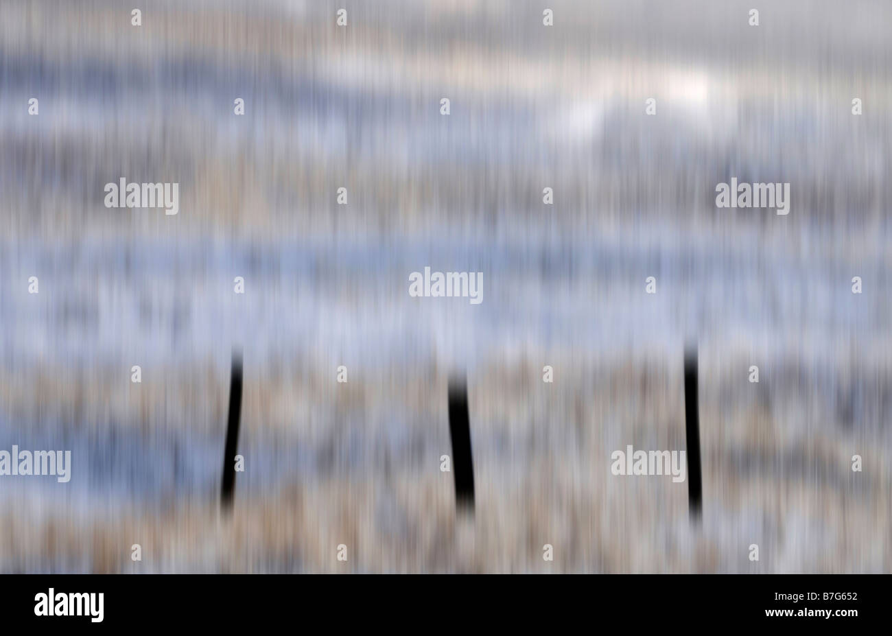 Recinzione in snow vacca serbatoio verde Teesdale (intenzionale di movimento della telecamera) Foto Stock