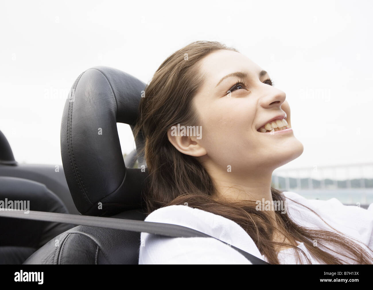 La donna in una cabriolet Foto Stock