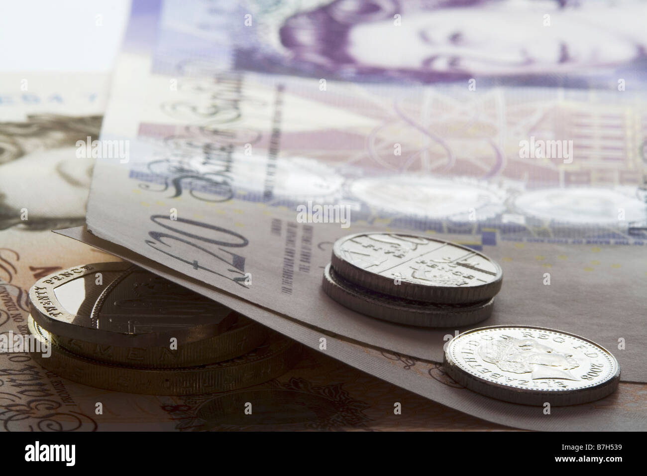 Sterling banconote e monete Foto Stock
