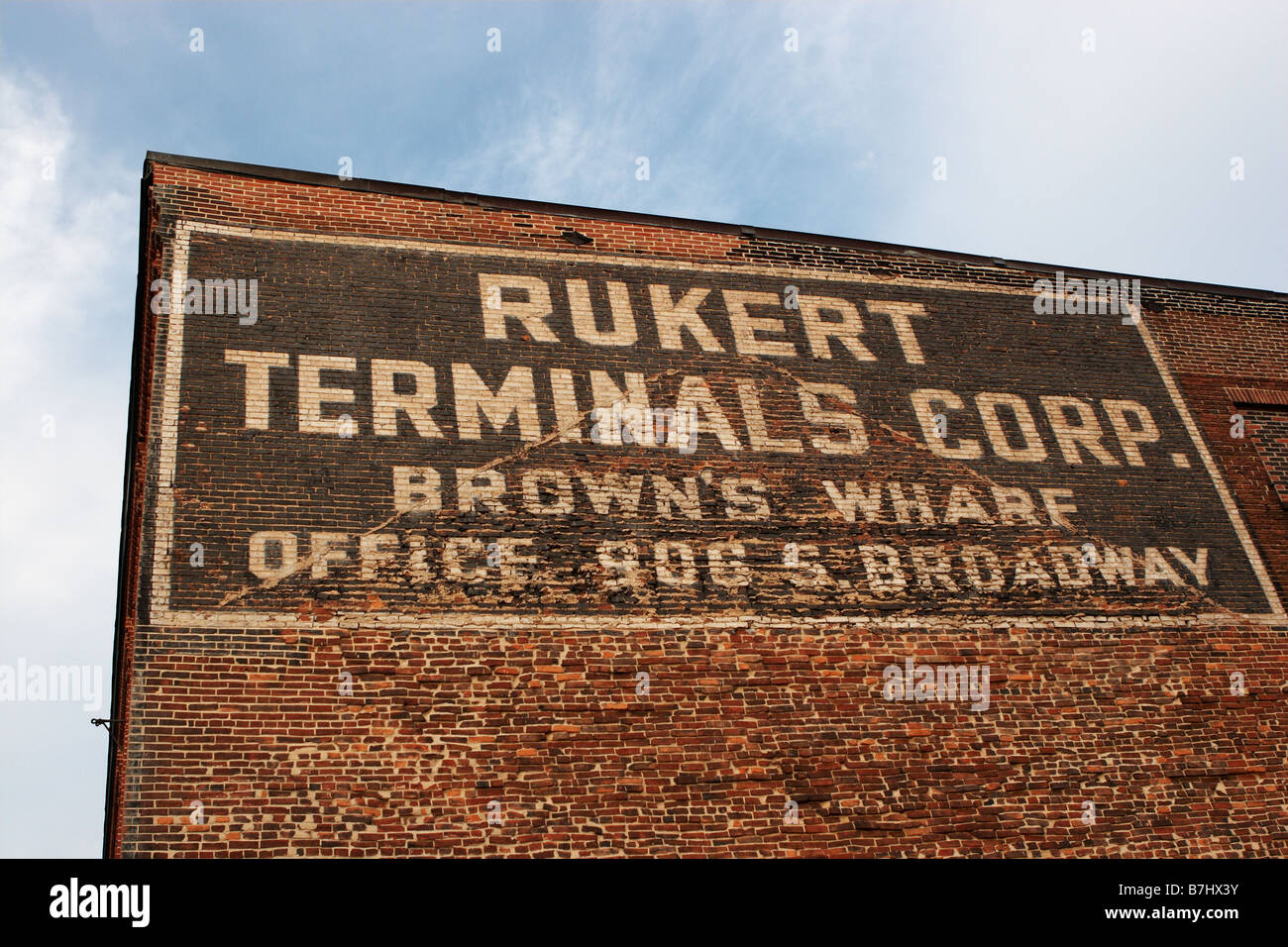 Un dipinto di vintage company registrazione su un edificio in mattoni al cadde s punto zona di Baltimore, Maryland Foto Stock