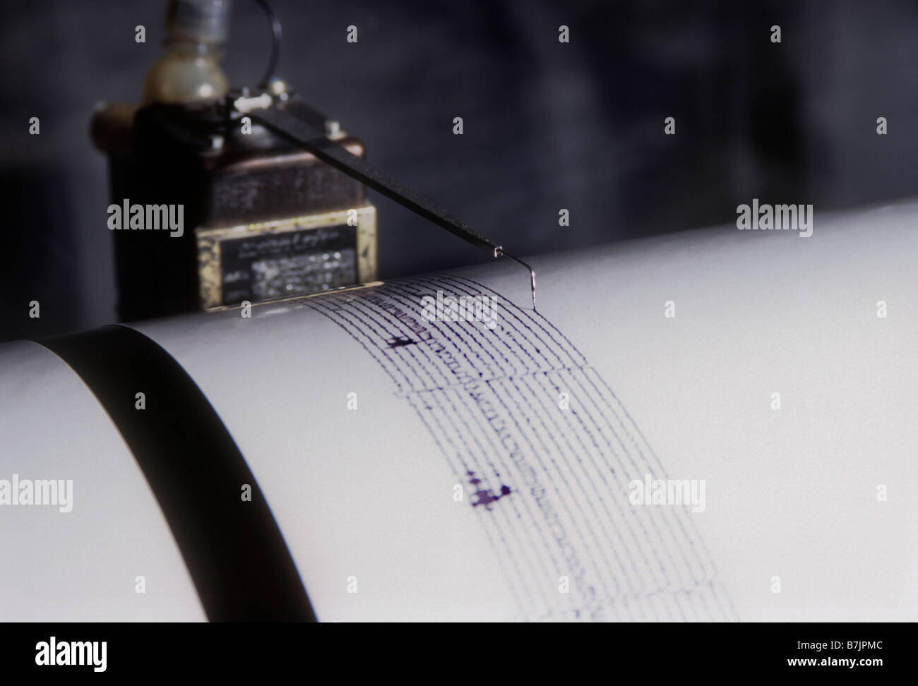 Ago crea pattern su sismografo come i terremoti si verificano Foto Stock