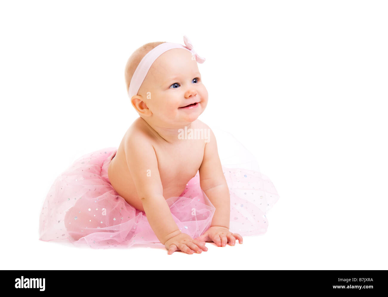 Baby Ballerina. Molto carino Happy Baby girl ballerina da indossare gonna. Isolato su bianco. Foto Stock