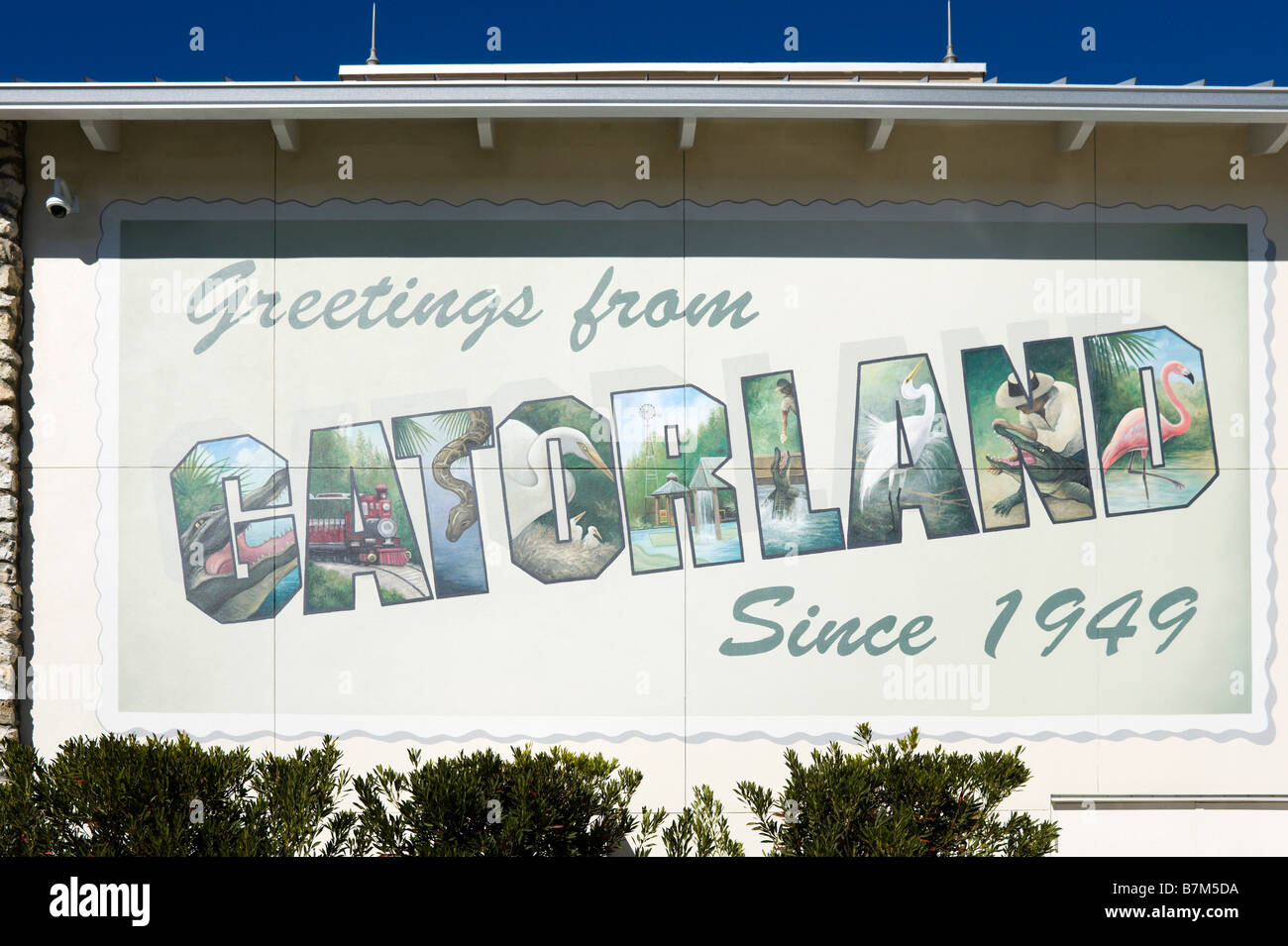 Il murale sulla parete al di fuori Gatorland, Orange Blossom Trail, Orlando, Florida centrale, STATI UNITI D'AMERICA Foto Stock
