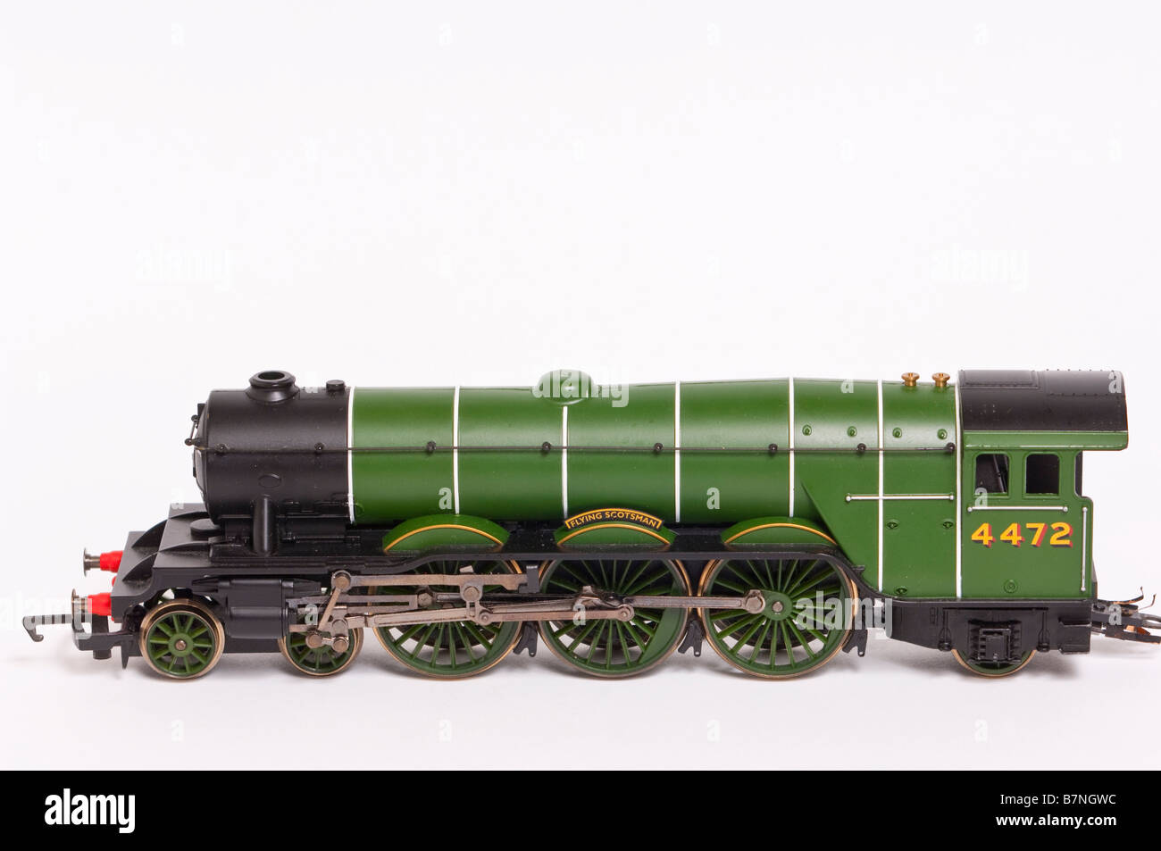 Una chiusura di un Hornby giocattolo elettrico modello di treno a vapore motore chiamato flying scotsman su sfondo bianco Foto Stock