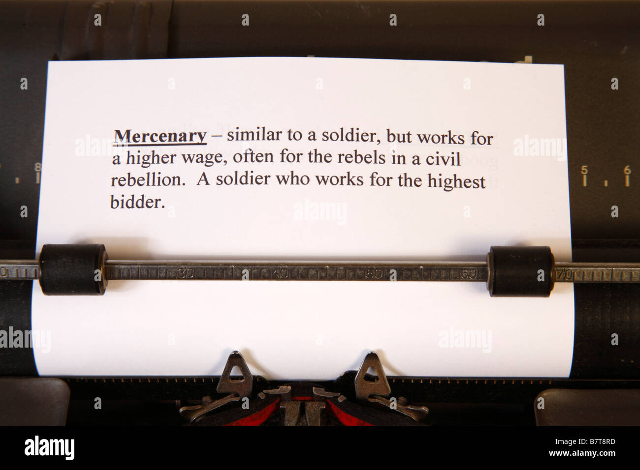 Definizione del mercenario in macchina da scrivere Foto Stock