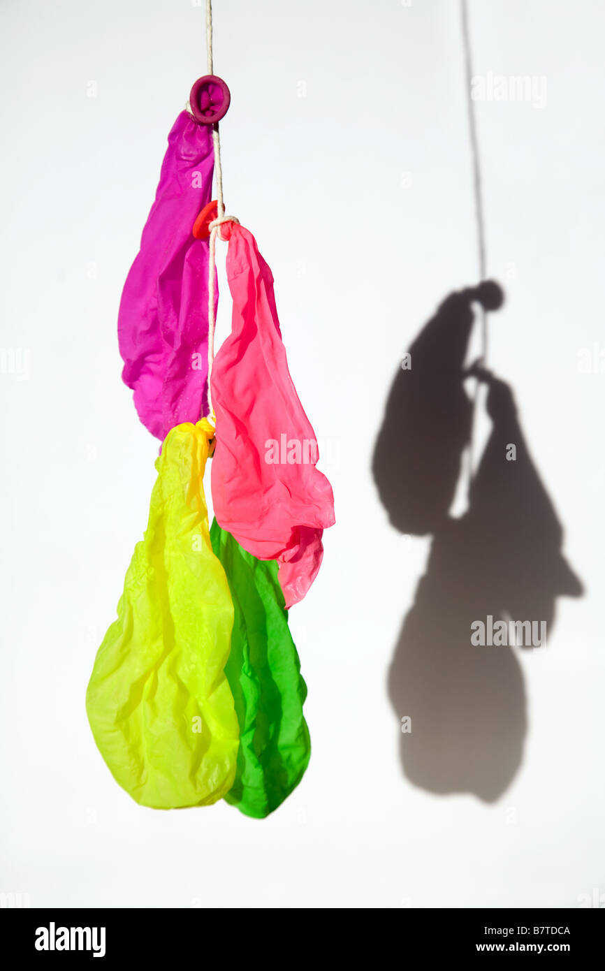 Scoppiare palloncini Foto Stock