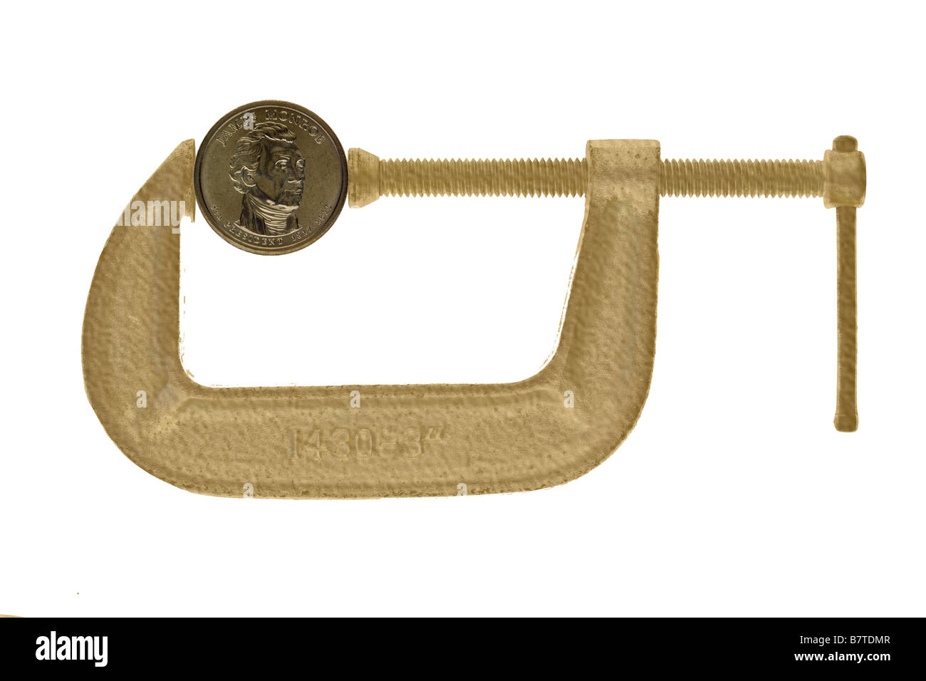 US dollar gold coin sotto pressione nella pinza di bloccaggio Foto Stock