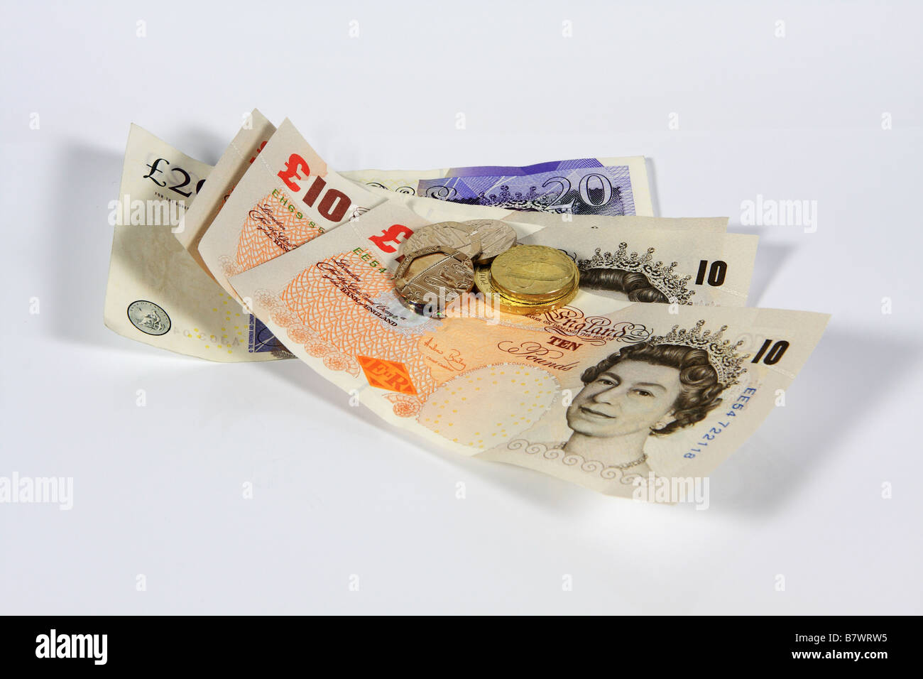 £10, £20 banconote e monete metalliche Foto Stock