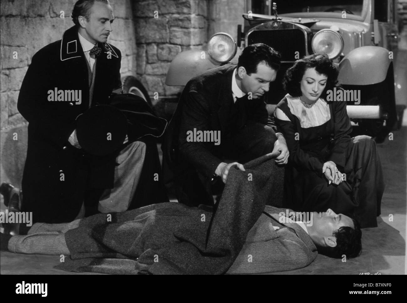 Espion onu un disparu al di sopra di ogni sospetto Anno: 1943 USA Conrad Veidt, Fred MacMurray, Joan Crawford Direttore: Richard Thorpe Foto Stock