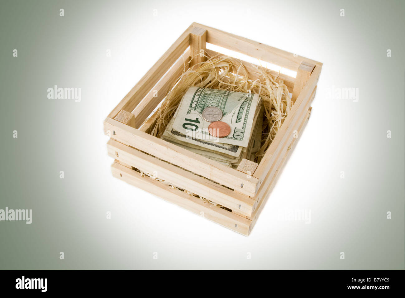 Angolo di alta vista di dieci dollari fatture all'interno di una gabbia in legno Foto Stock