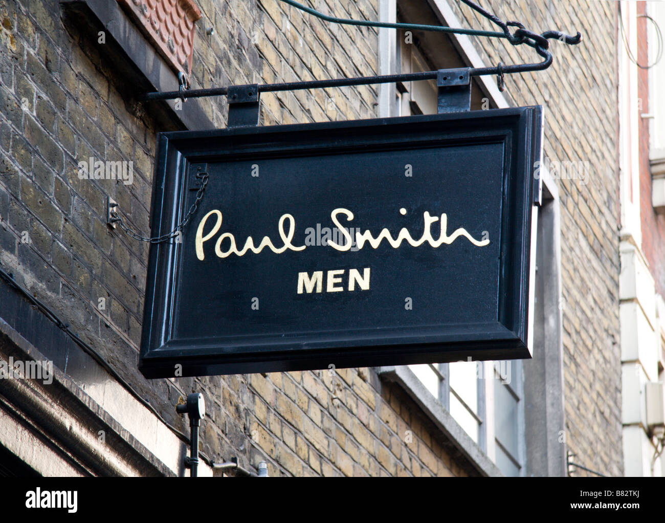 Il segno sopra il negozio ingresso al Paul Smith abbigliamento uomo negozio di Covent Garden di Londra. Gen 2009 Foto Stock