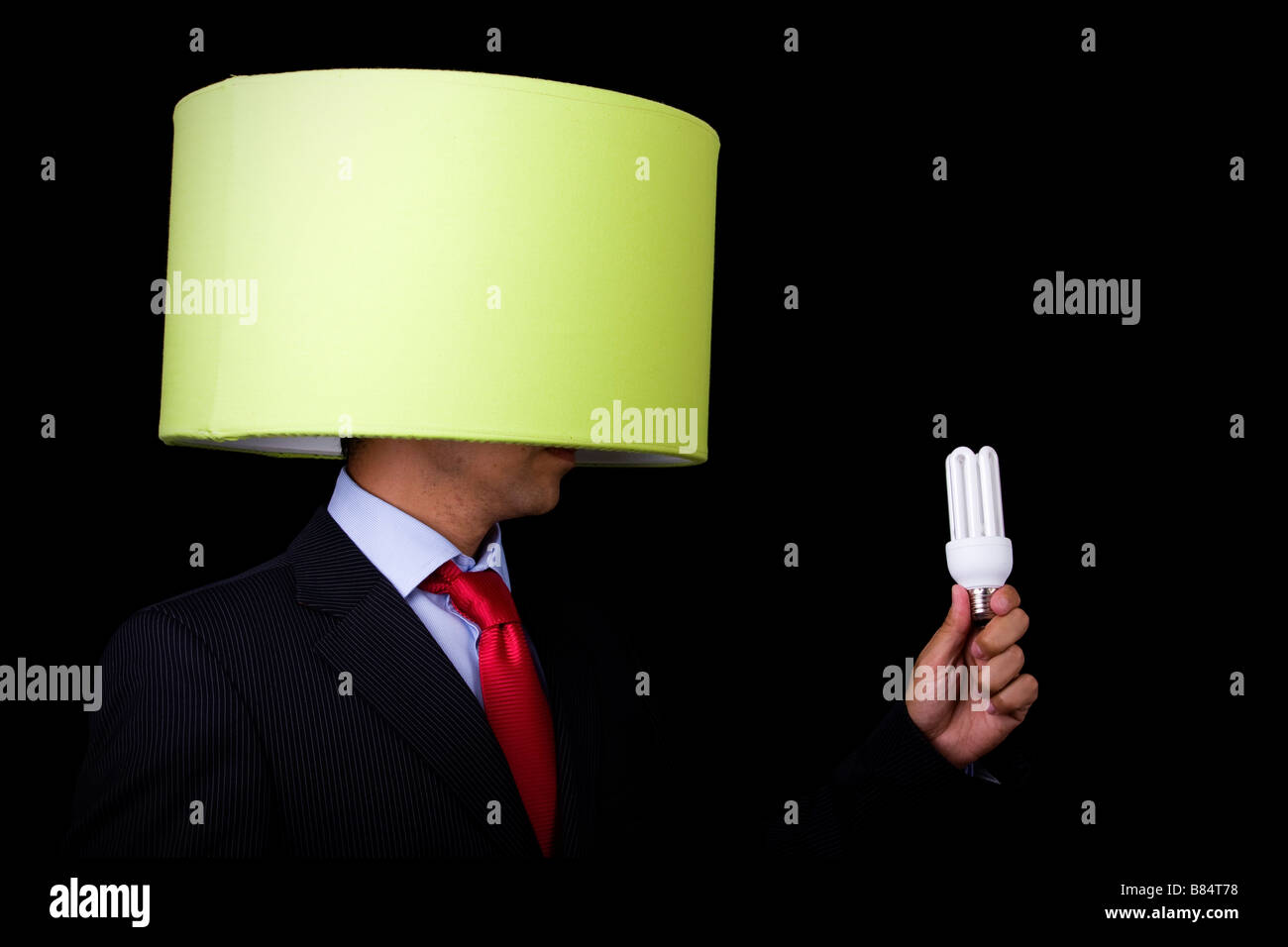 Imprenditore tenendo una lampada non è la sua idea Foto Stock